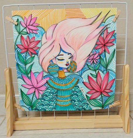 La que respira entre flores